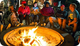 Evening time relaxation in front of a roaring fire